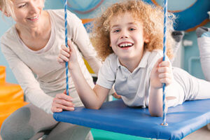 a child smiles after getting autism treatment in dallas texas